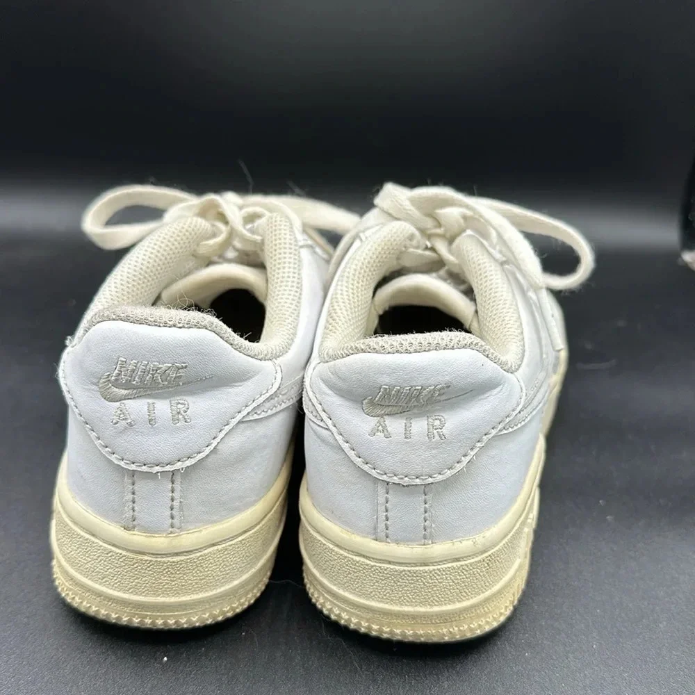 kids white Nike Air Force 1 sneakers size 3.5y